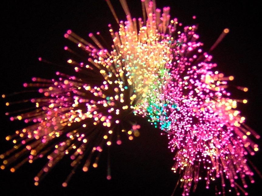 Light shines through fibre optic cables.