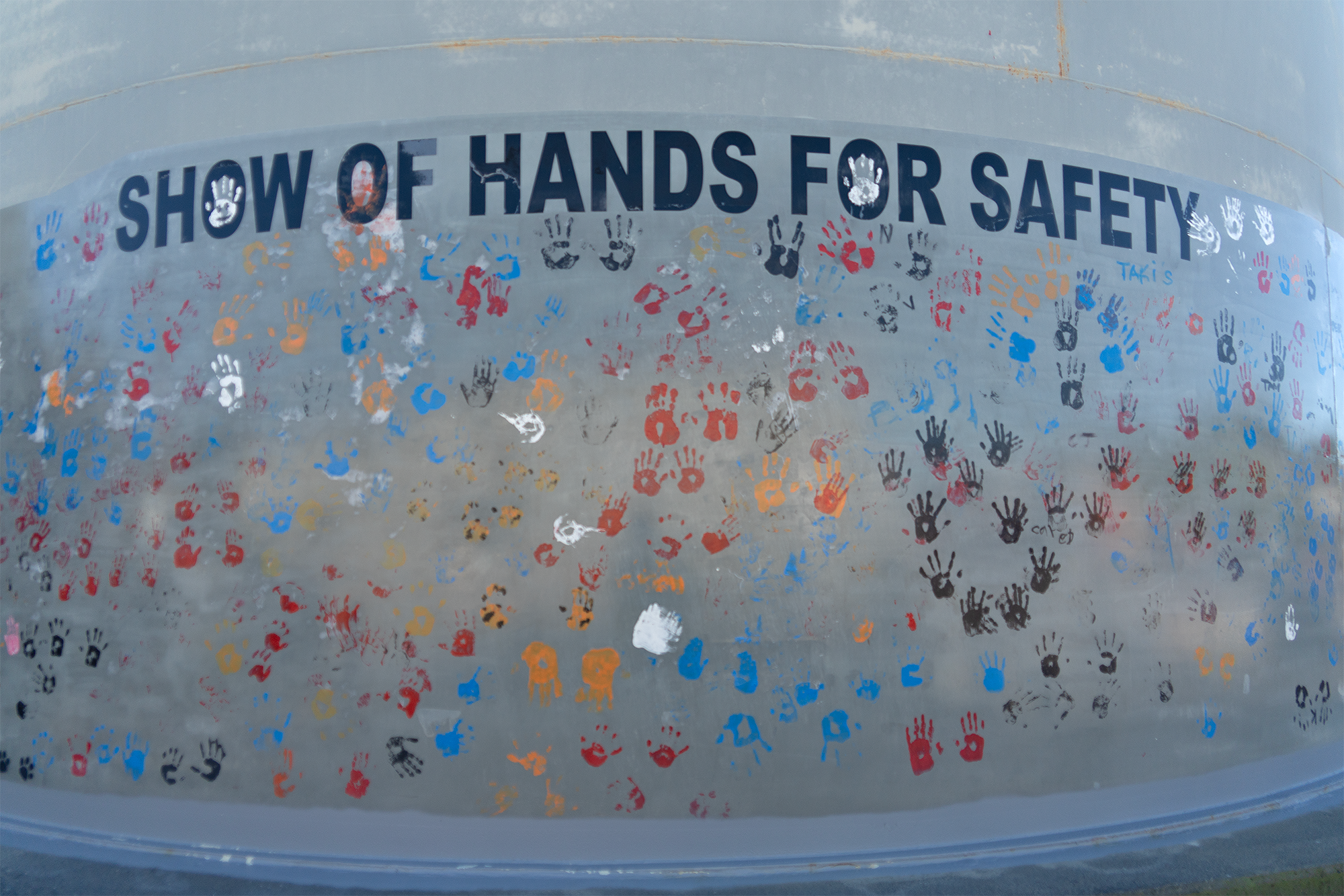 Hands pictured in a safety-related setting.