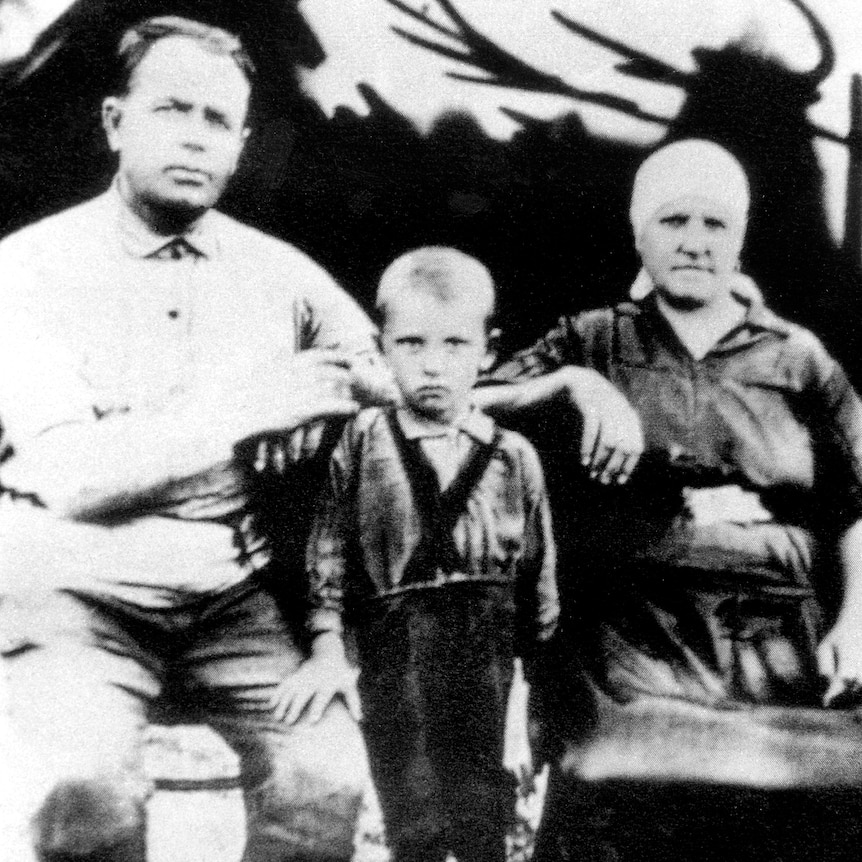 Mikhail Gorbachev standing in between his Ukrainian maternal grandparents.