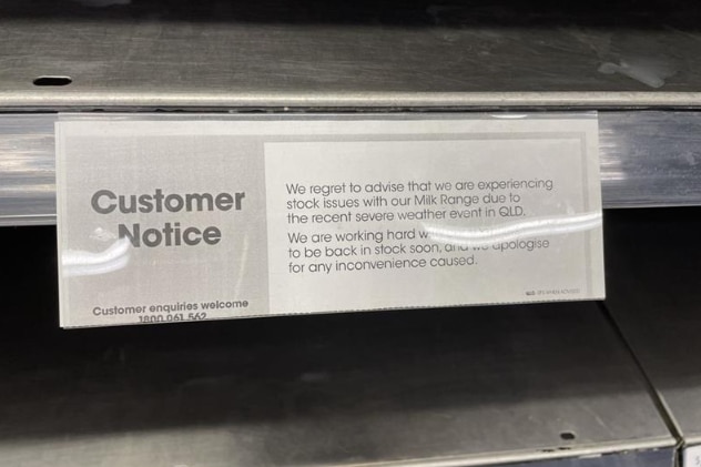 A sign in a grocery store says Queensland weather has caused supply issues