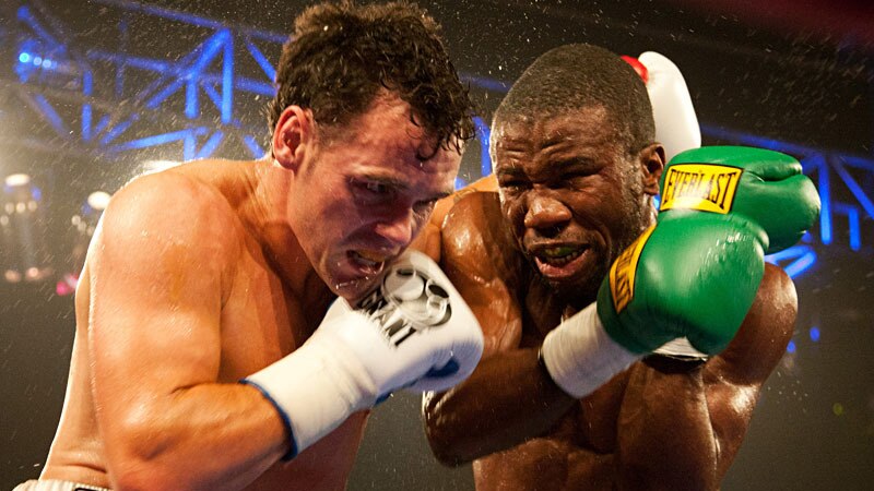 Daniel Geale (left) went toe-to-toe with Eromosele Albert to win on points despite an injury to his right hand.