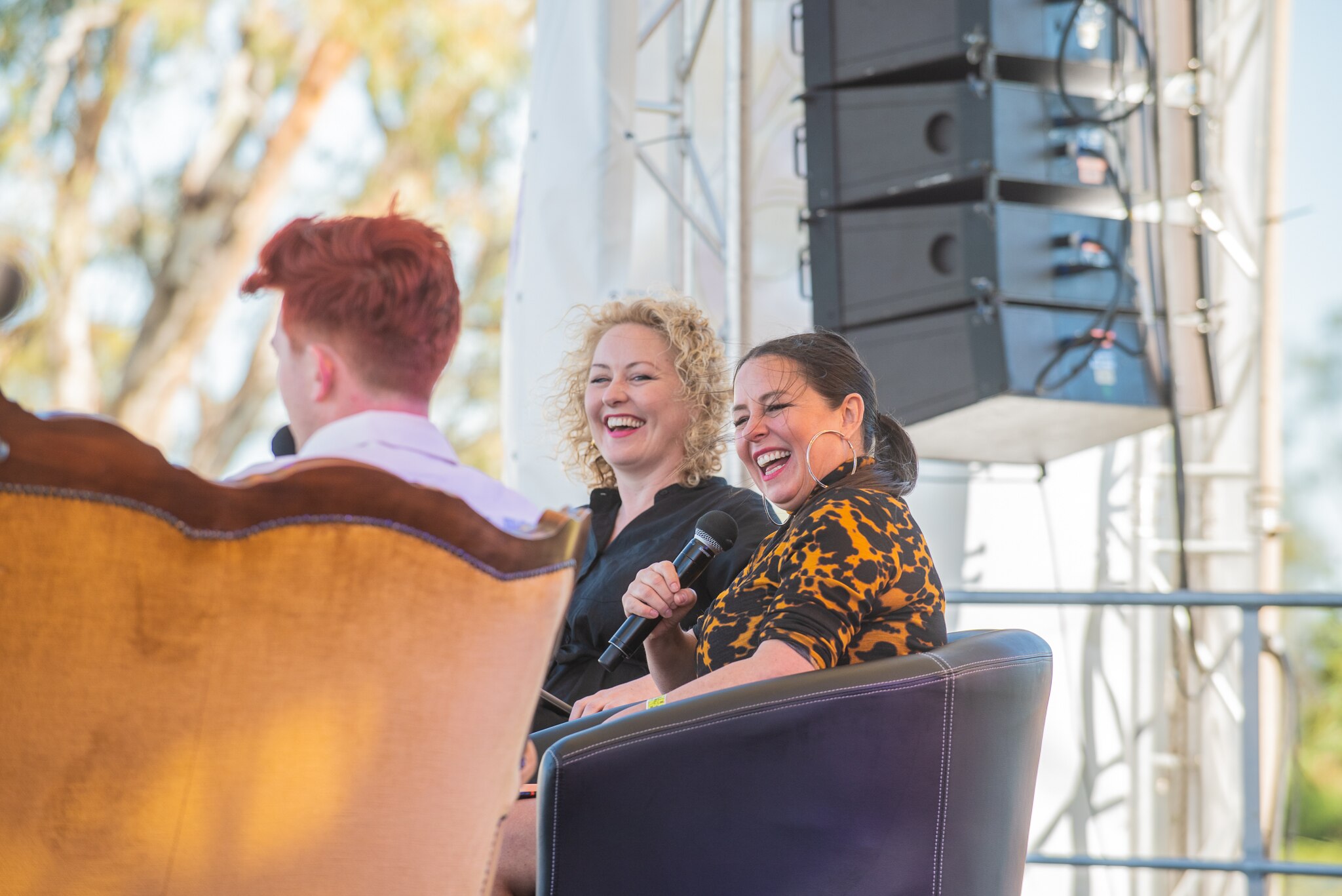 Zan Rowe, Myf Warhurst and Rhys Nicholson on stage at Comedy in the Vines