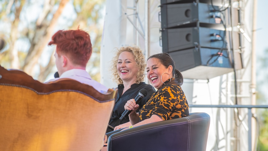 Zan Rowe, Myf Warhurst and Rhys Nicholson on stage at Comedy in the Vines