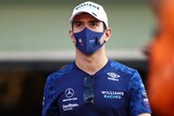 F1 driver Nicholas Latifi, in a face mask, looks into the distance during the Grand Prix of Abu Dhabi
