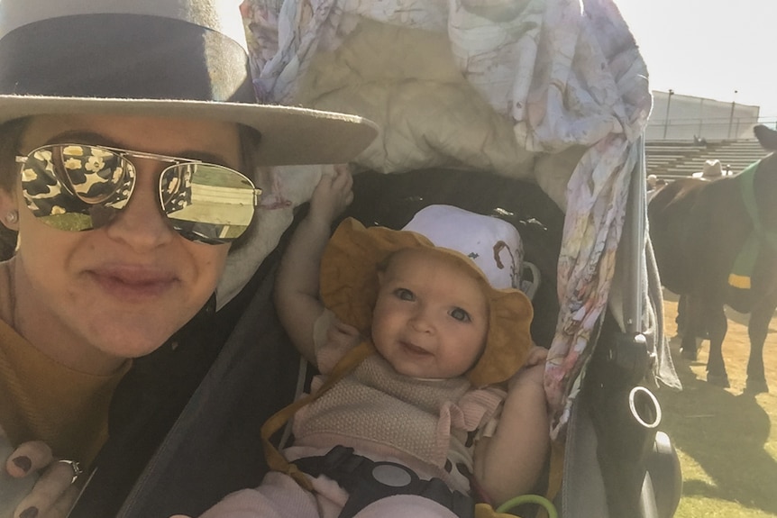 Mum and daughter in a pram.