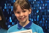 Charlise in her school uniform