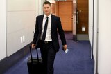 Australian cricket captain Michael Clarke at Sydney airport before heading to England.