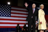 John McCain and his wife Cindy take the stage
