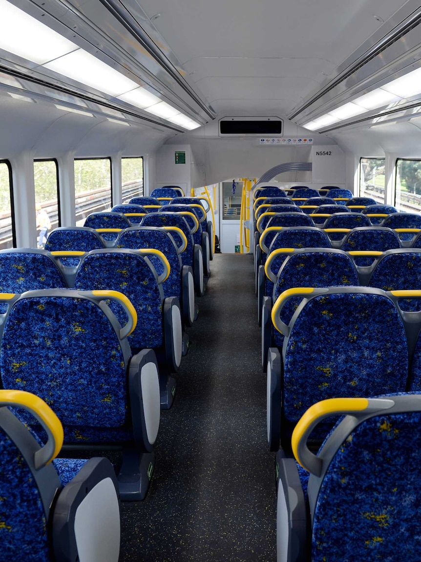 The inside of a Sydney Transport Waratah train carriage