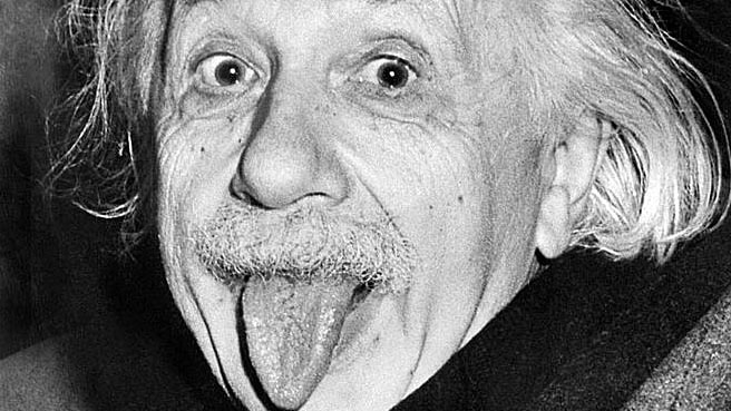 Albert Einstein sticks out his tongue at photographers on his 72nd birthday.