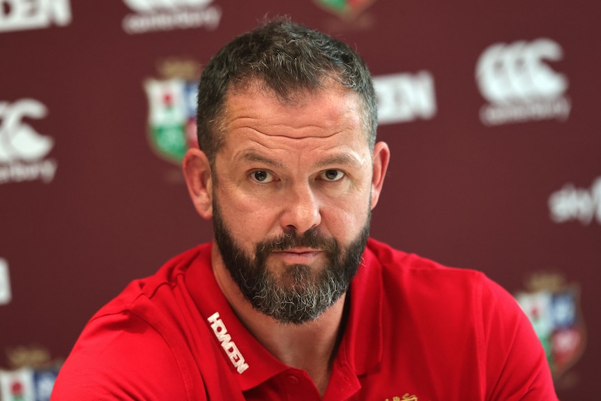 Andy Farrell wears a red polo shirt
