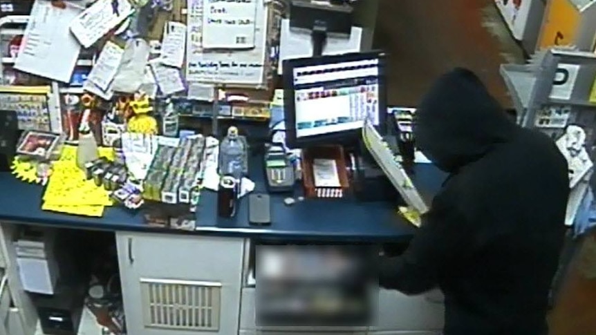 CCTV footage of armed robbery at a Kingaroy service station on April 7, 2016.