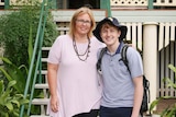 Heather Robson and her son, Townsville Year 12 student Max Robson, stand outside their house.