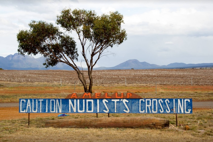 A photo of the road safety message Caution Nudist's Crossing in Amelup