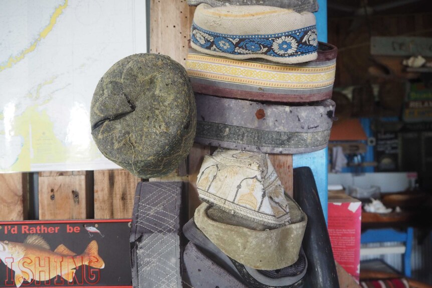 A collection of Indonesian hats which have washed up on the beach at Bremer Island.
