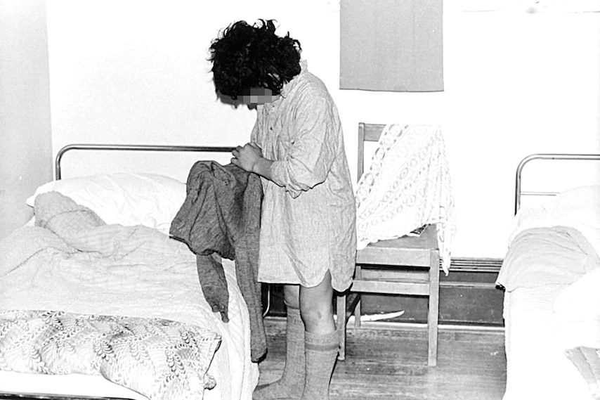 An unidentified child in a children's home.