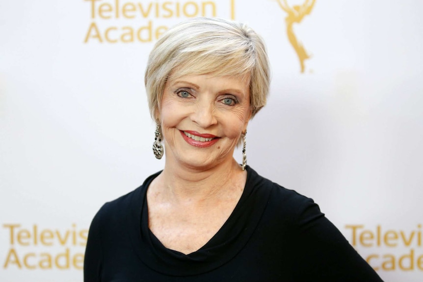 Florence Henderson poses at a Beverly Hills cocktail reception in July, 2014.