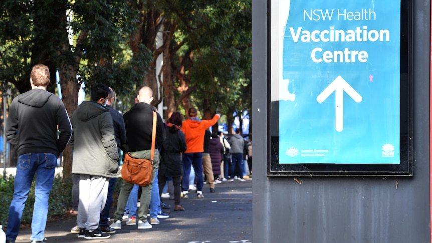 large group of people queue