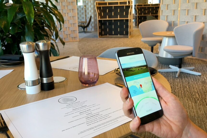A smartphone shows the location of a steak served at a restaurant.