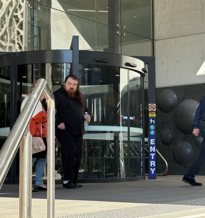 Man walking from court.