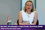 Kym Peake a woman with blond hair, wearing a white top, testifying at a public inquiry.