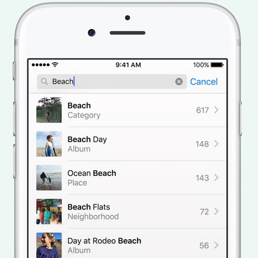 The Photos app runs on an iPhone showing a search for beach photos
