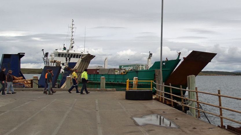 Freight ship Statesman docks at Lady Barron wharf, Flinders Island.