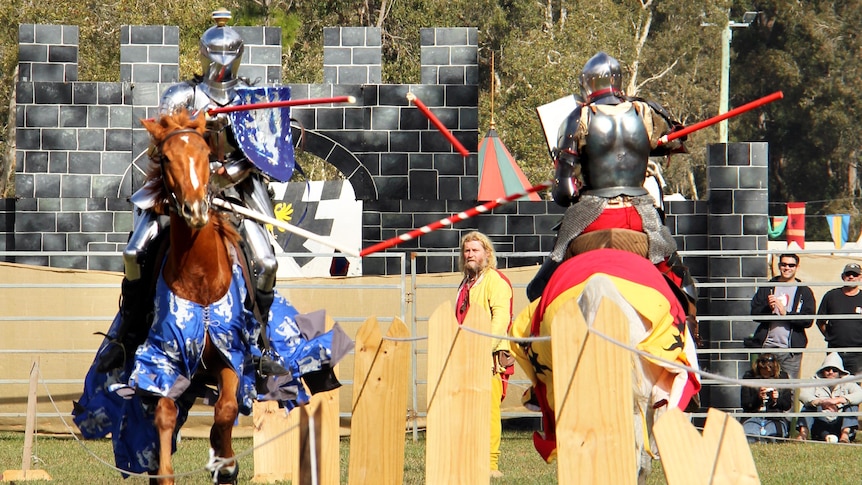 Jousters break their lances on each other during a pass at the Abbey Medieval Festival on July 7, 2012.