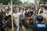 Supporters of former Pakistani Prime Minister Nawaz Sharif clash with police.