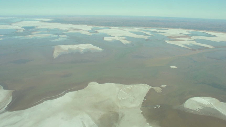 A view of a huge salt lake as seen from an aeroplane.