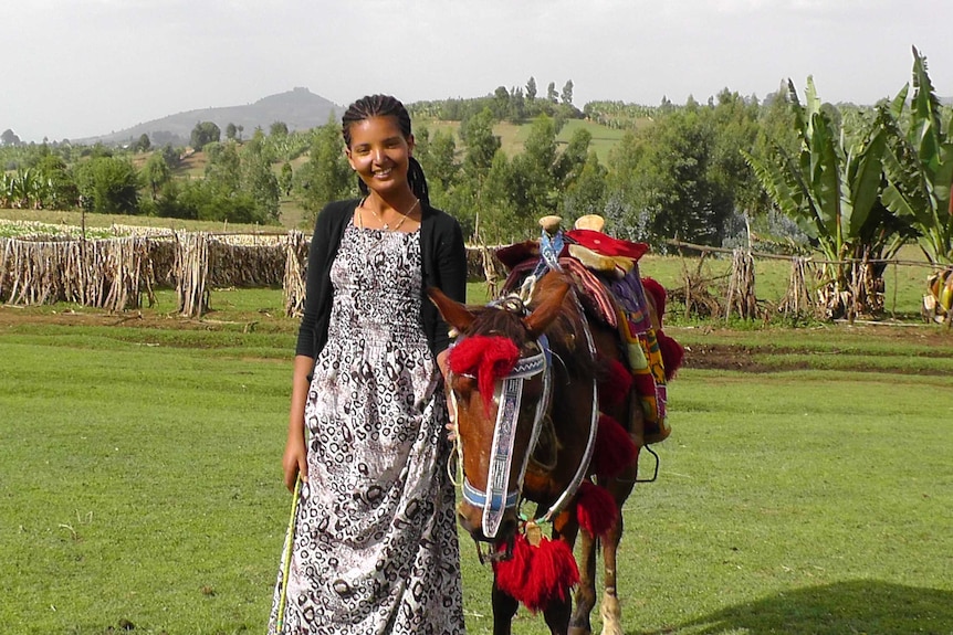 A woman and a donkey in Ethiopia