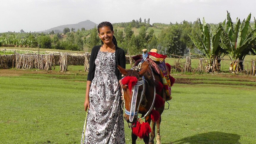 A woman and a donkey in Ethiopia