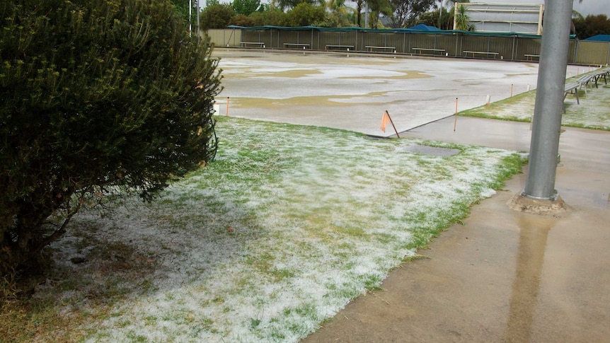 Hail over the green at the Crows Nest Bowls Club after today's storm that swept across the Darling Downs.