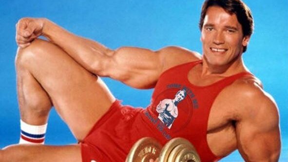 Schwarzenegger lifting weights.