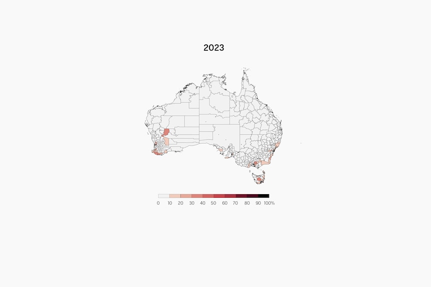 A black and white map of local government areas in Australia, with some sections in various shades of pink.