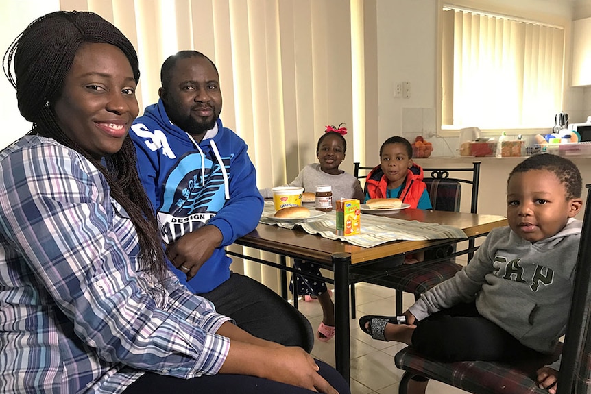 Mamode Osikoye with her husband and three kids