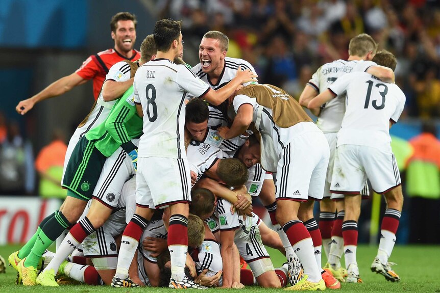 German players celebrate winning the World Cup after defeating Argentina 1-0 in extra time.