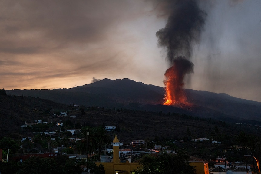 Lava from a volcano eruption flows on the island of La Palma