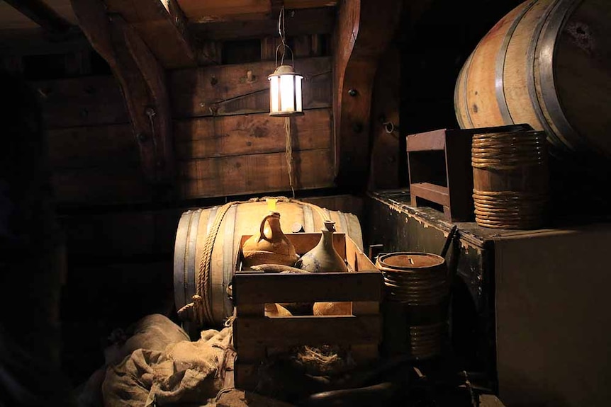 Wine barrels stacked in a cargo hold