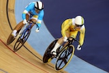 Anna Meares (yellow) defeats Ukraine's Lyubov Shulika during the track cycling women's sprint quarter-finals.