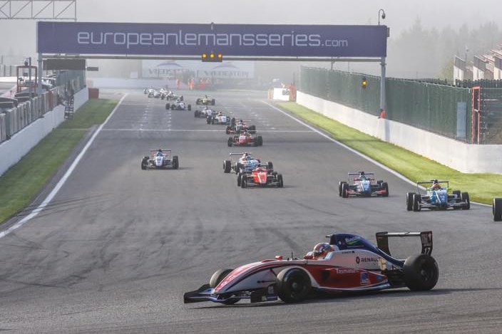 Racing cars on a track in Europe.