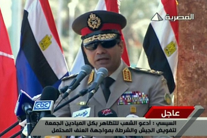 Egypt's army chief General Abdel Fattah al-Sisi addresses Egyptians
