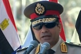 Egypt's army chief General Abdel Fattah al-Sisi addresses Egyptians