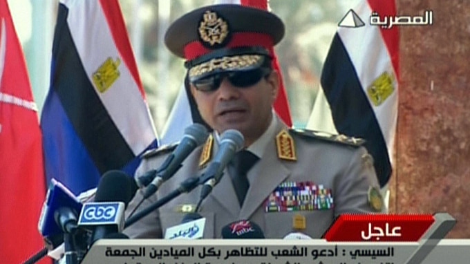 Egypt's army chief General Abdel Fattah al-Sisi addresses Egyptians
