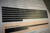 A document page with botched censorship, the text showing through black redactions.