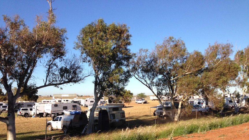 Campers and caravans set up at the Port Hedland racecourse