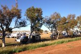 Campers and caravans set up at the Port Hedland racecourse