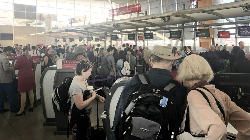 People queued up at airport checkin