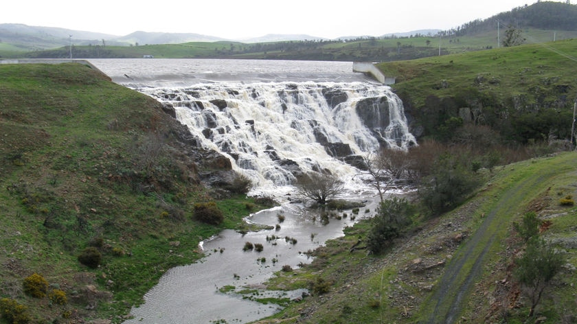 Craigbourne Dam overflows at the end of winter 2009, after years of being nearly empty.