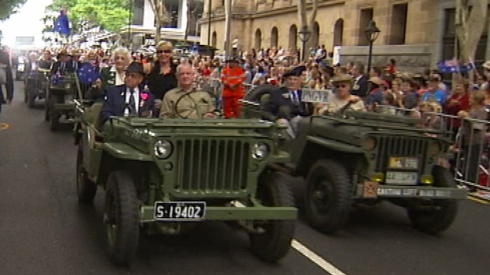 Thousands line streets for Anzac Day parade in Brisbane's CBD on April 25, 2012.